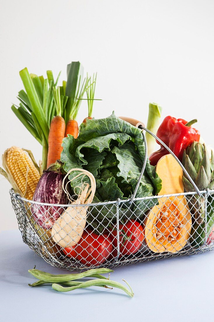 Fresh vegetables in a metal basket