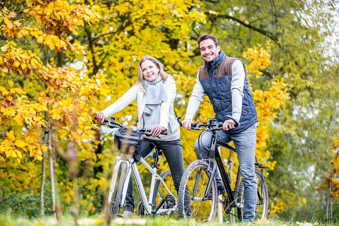 Couple cycling together