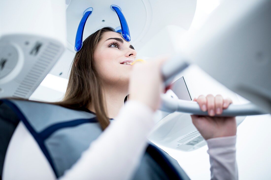 Young woman having dental x-ray