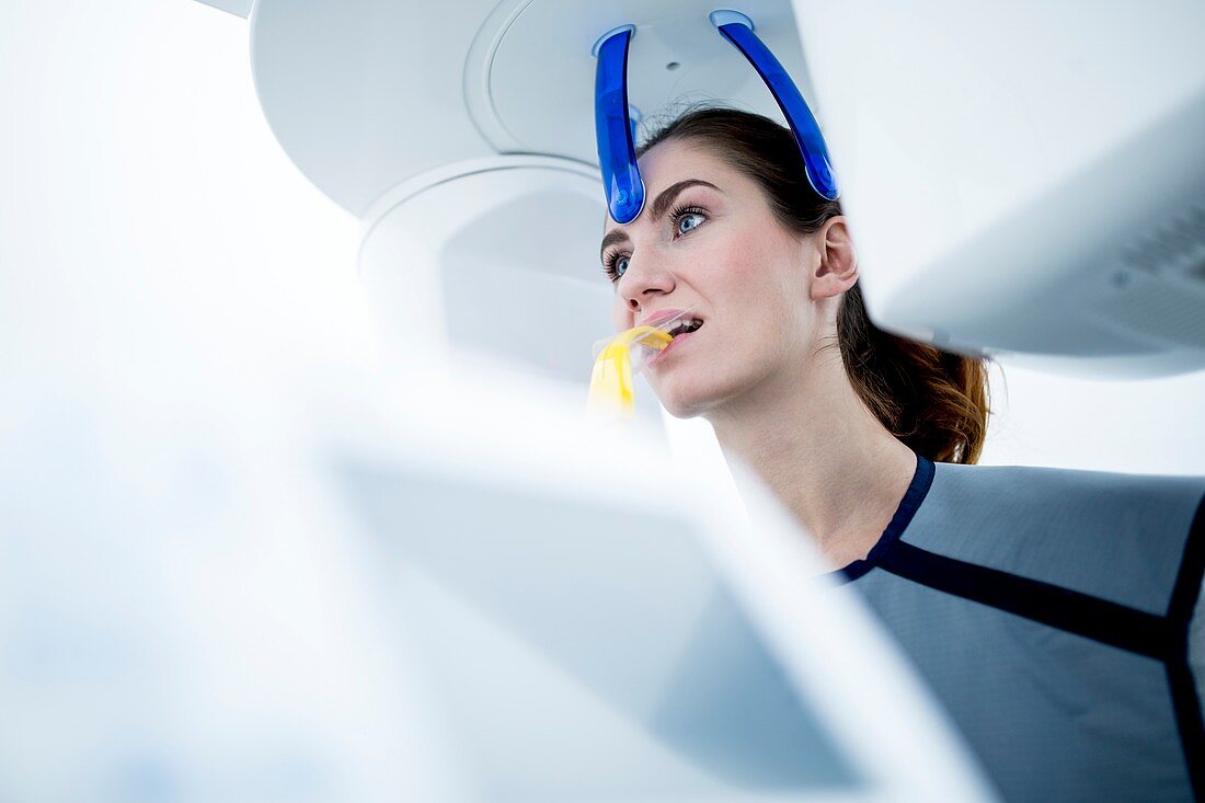 Young woman having dental x-ray