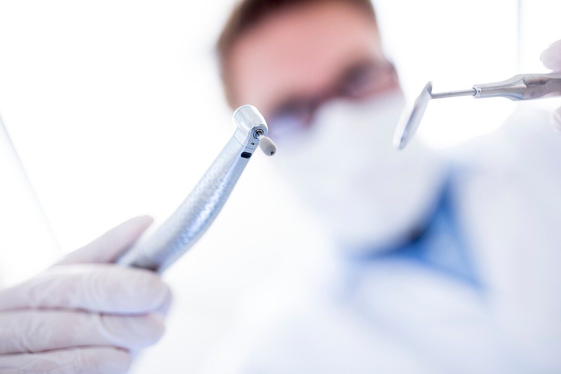 Dentist with dental equipment