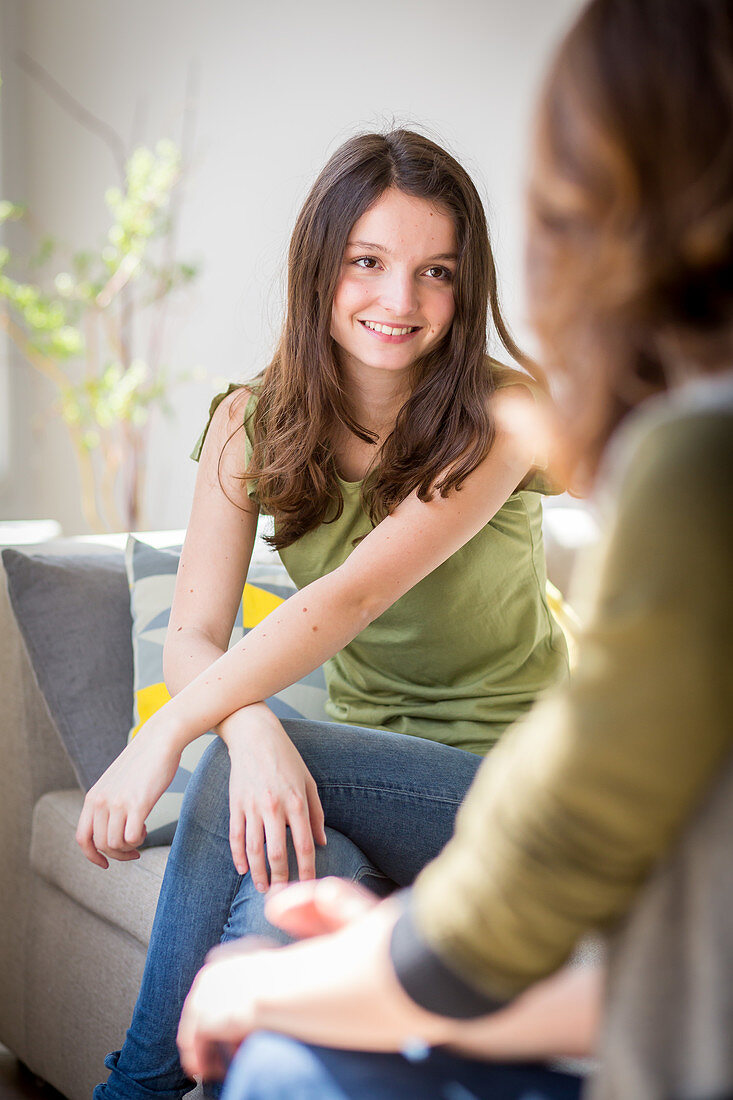 Woman talking with a teenager