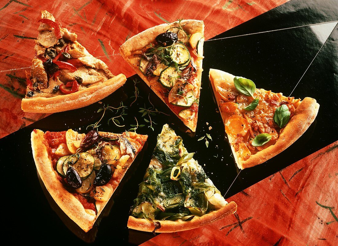 Four Slices of Pizza with assorted Toppings