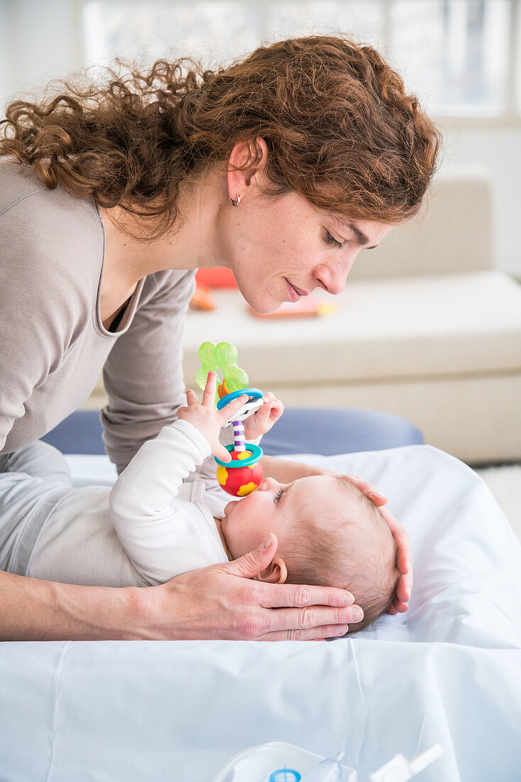 Scalp examination of baby girl