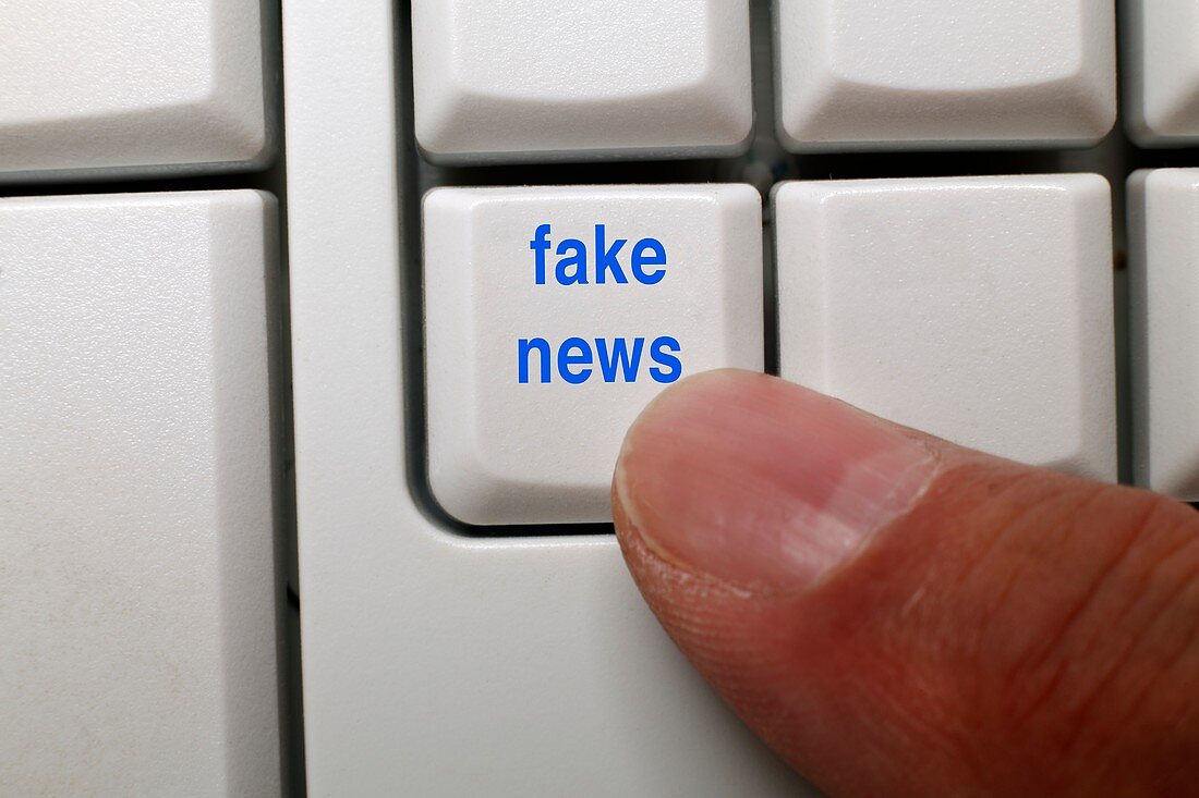 Fake news key on a computer keyboard