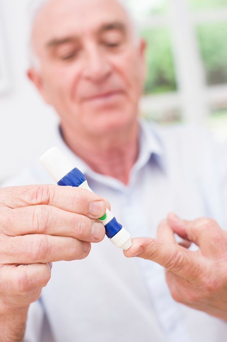 Man testing glucose