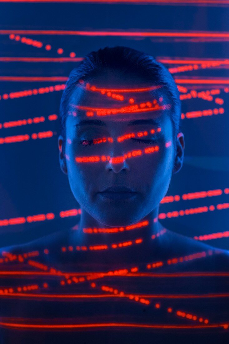 Woman with red lights on face