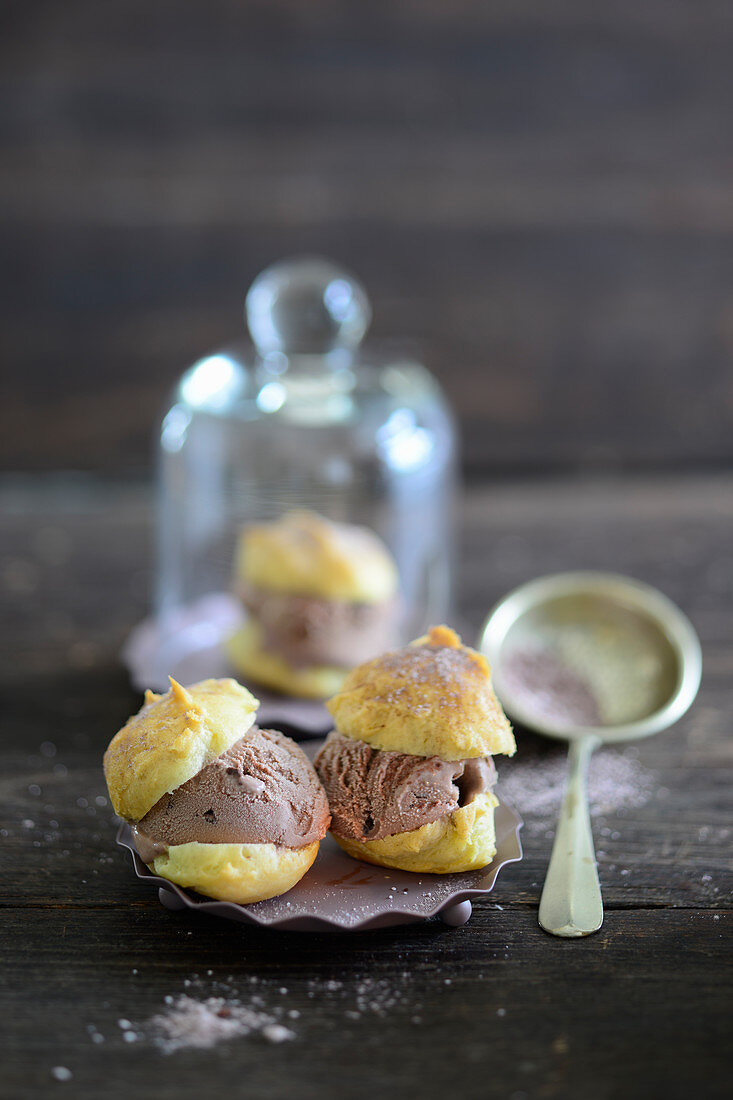 Profiteroles filled with chocolate ice cream