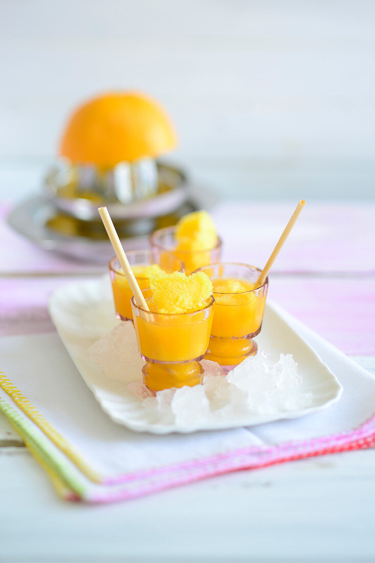 Mango shots with orange juice