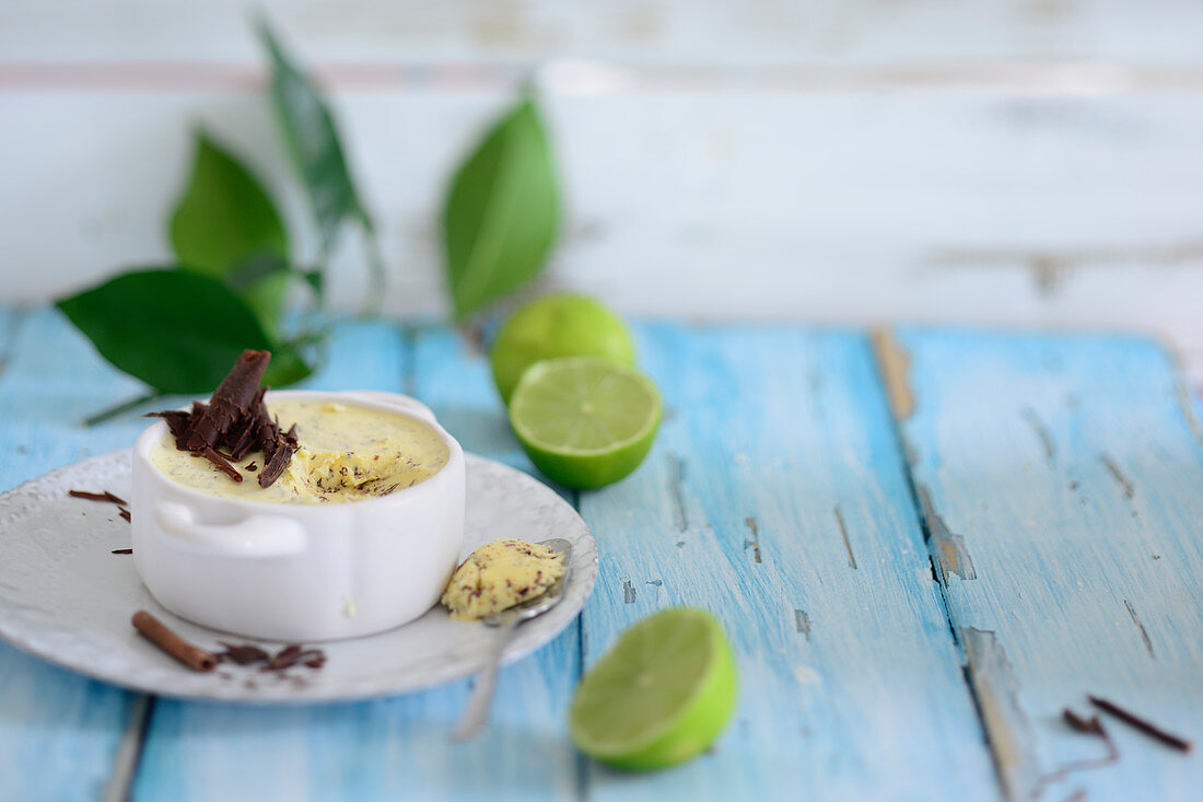 Stracciatella ice cream with chocolate shavings and limes