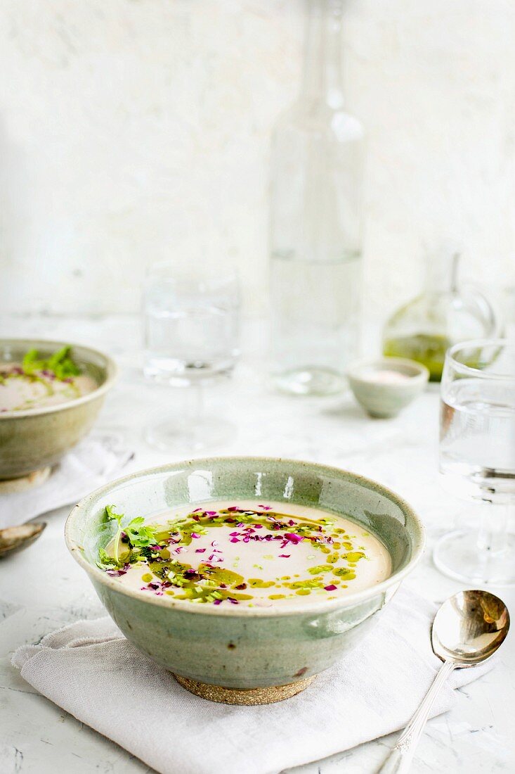 Coconut Red Lentil Purple Cabbage Soup with Cilantro Oil served with white wine