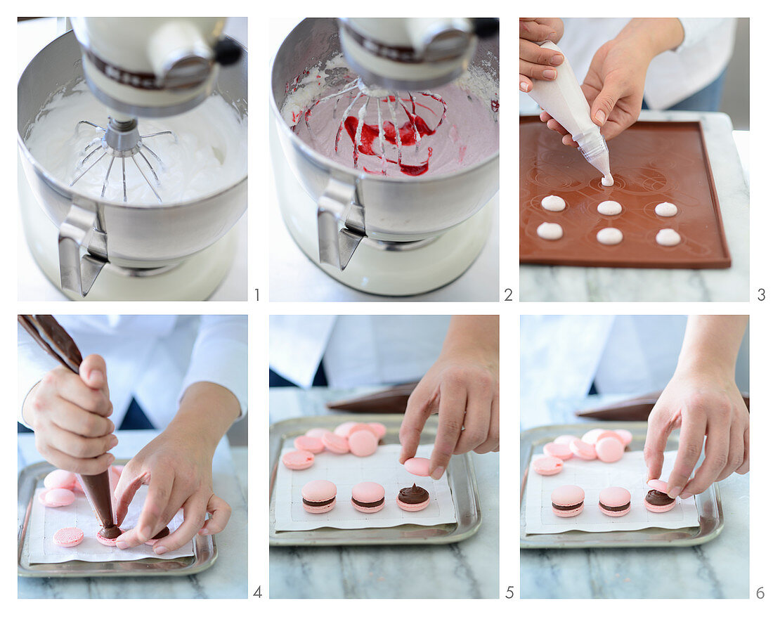 Pink macaroons with chocolate cream being made