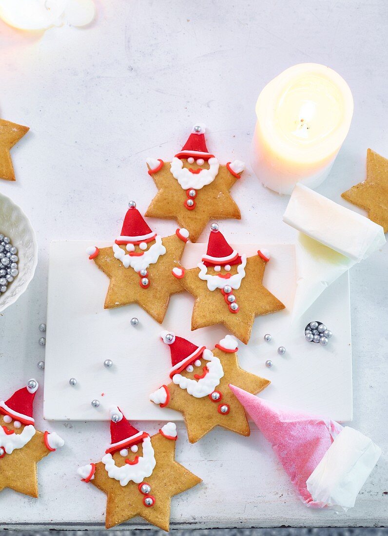 Gingerbread stars decorated as Father Christmas