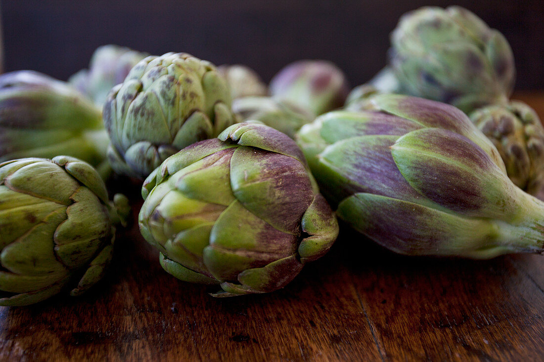 Artichokes on a wooden table