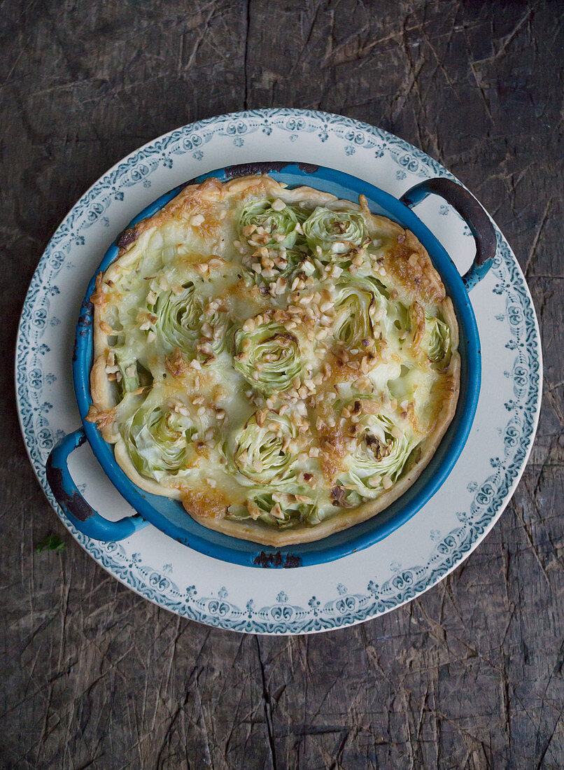 Pointed cabbage quiche with hazelnuts