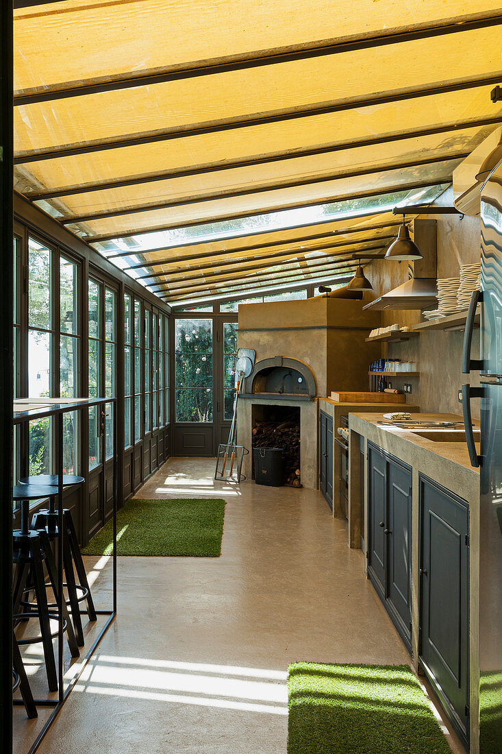 Brick pizza oven in seasonal kitchen