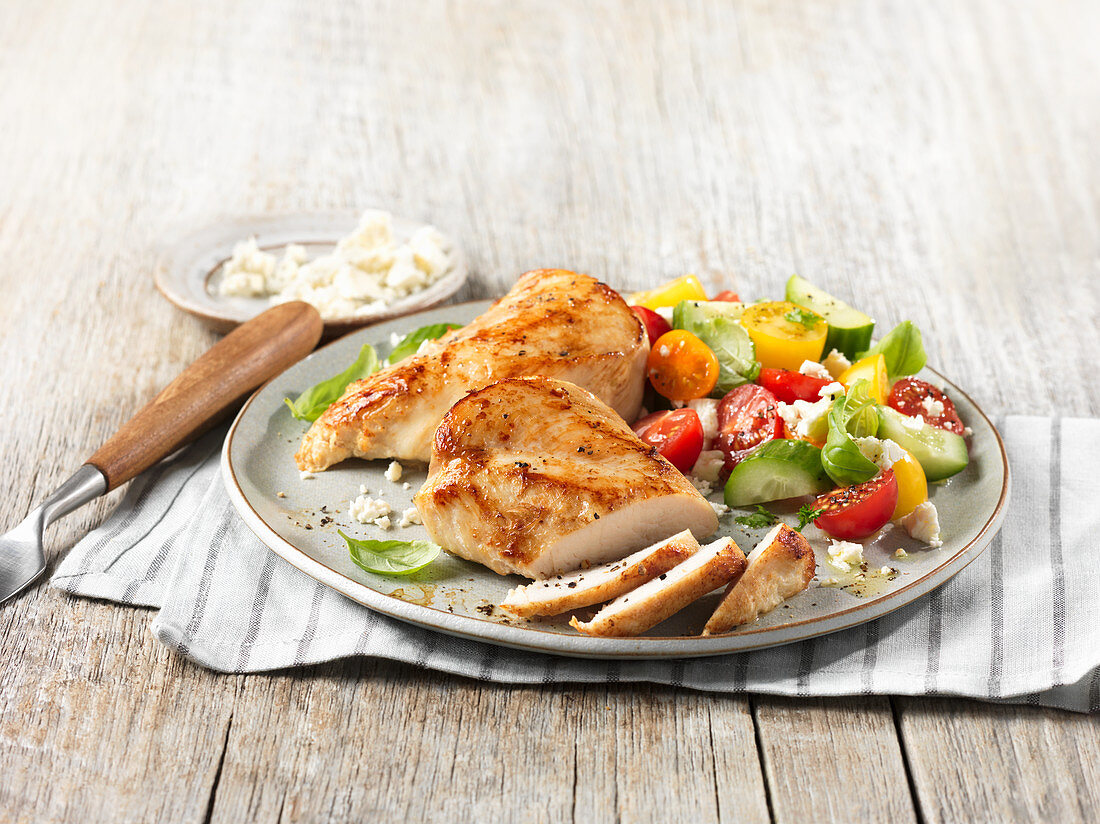 Baked chicken breast with vegetable salad