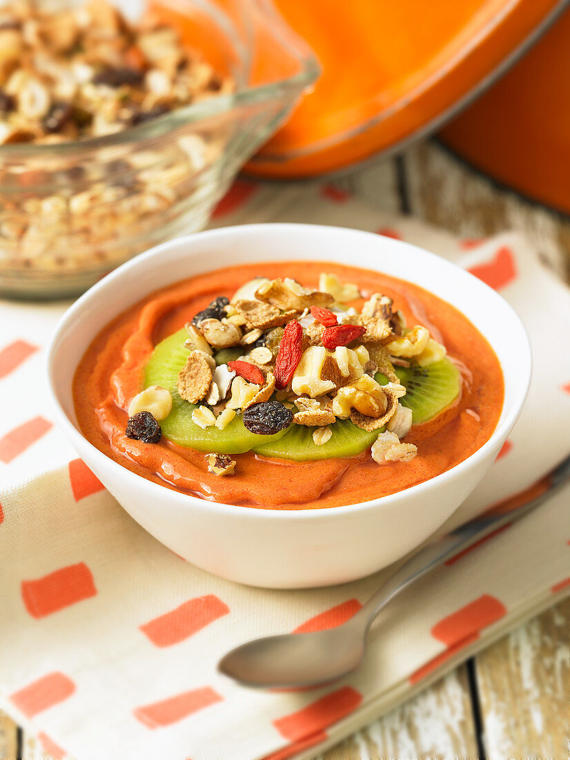 A raspberry smoothie bowl with goji berries