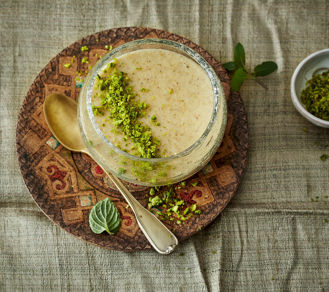 Harireh Badum – Persian almond rice pudding with pistachios