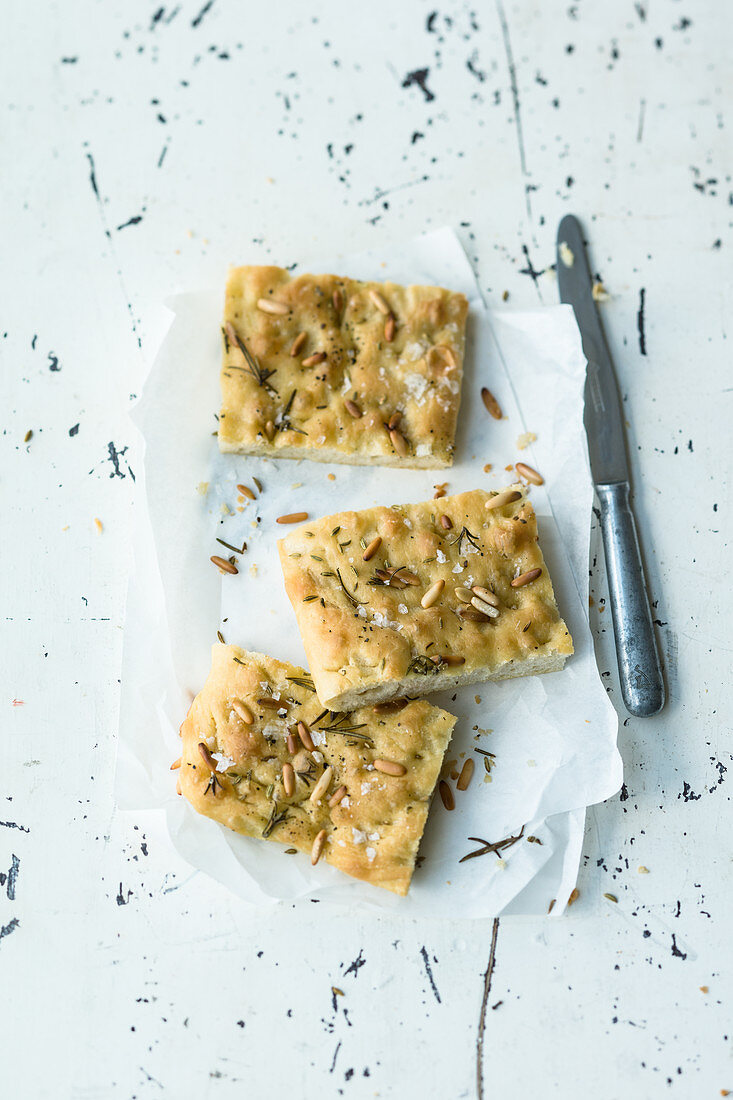 Ligurian focaccia with pine nuts and rosemary (Italy)