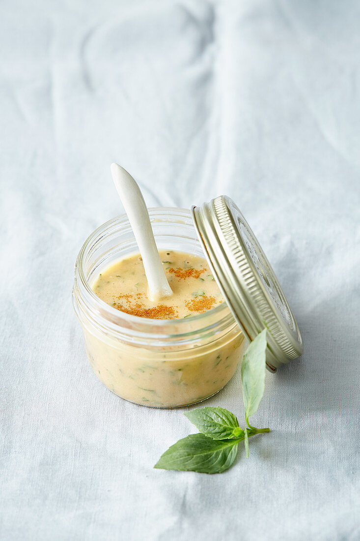 A spicy orange and peanut dip with honey