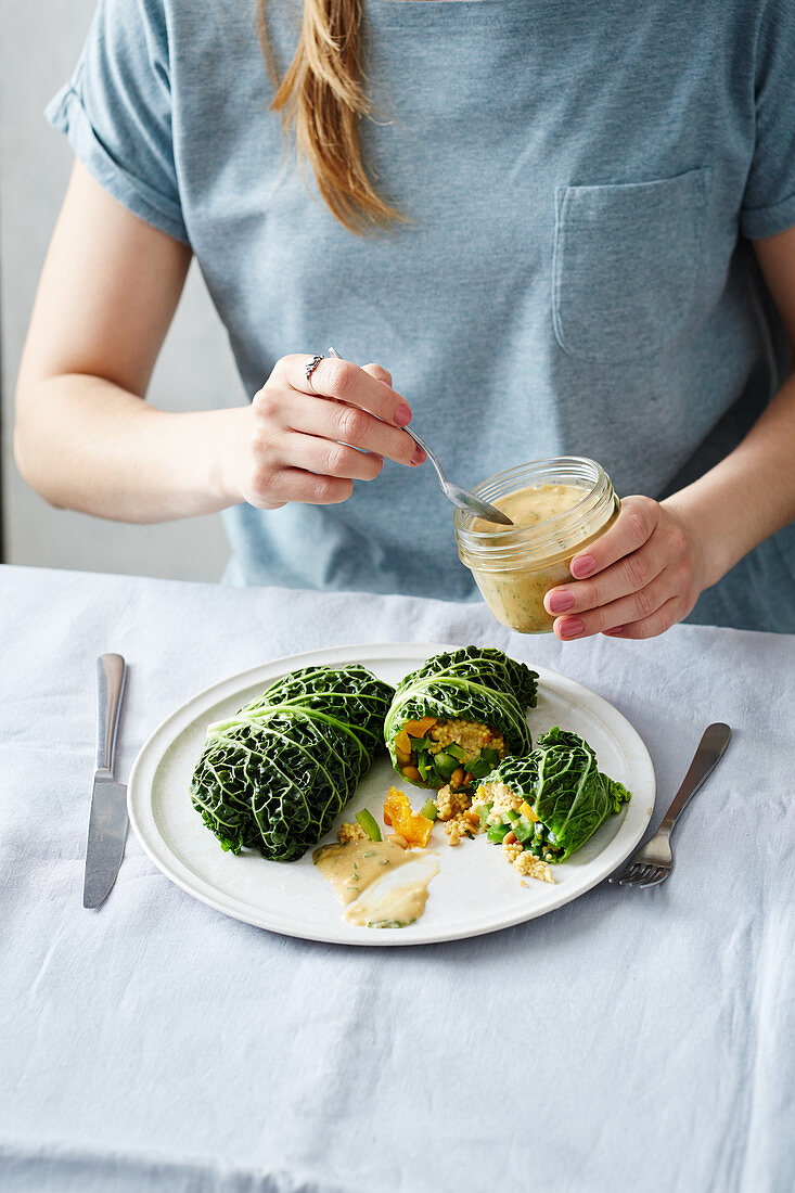 Vegan savoy cabbage with a pumpkin and millet filling