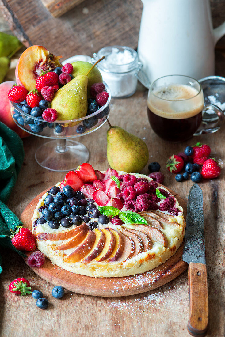Pie with quark fillig and different fruit and berries
