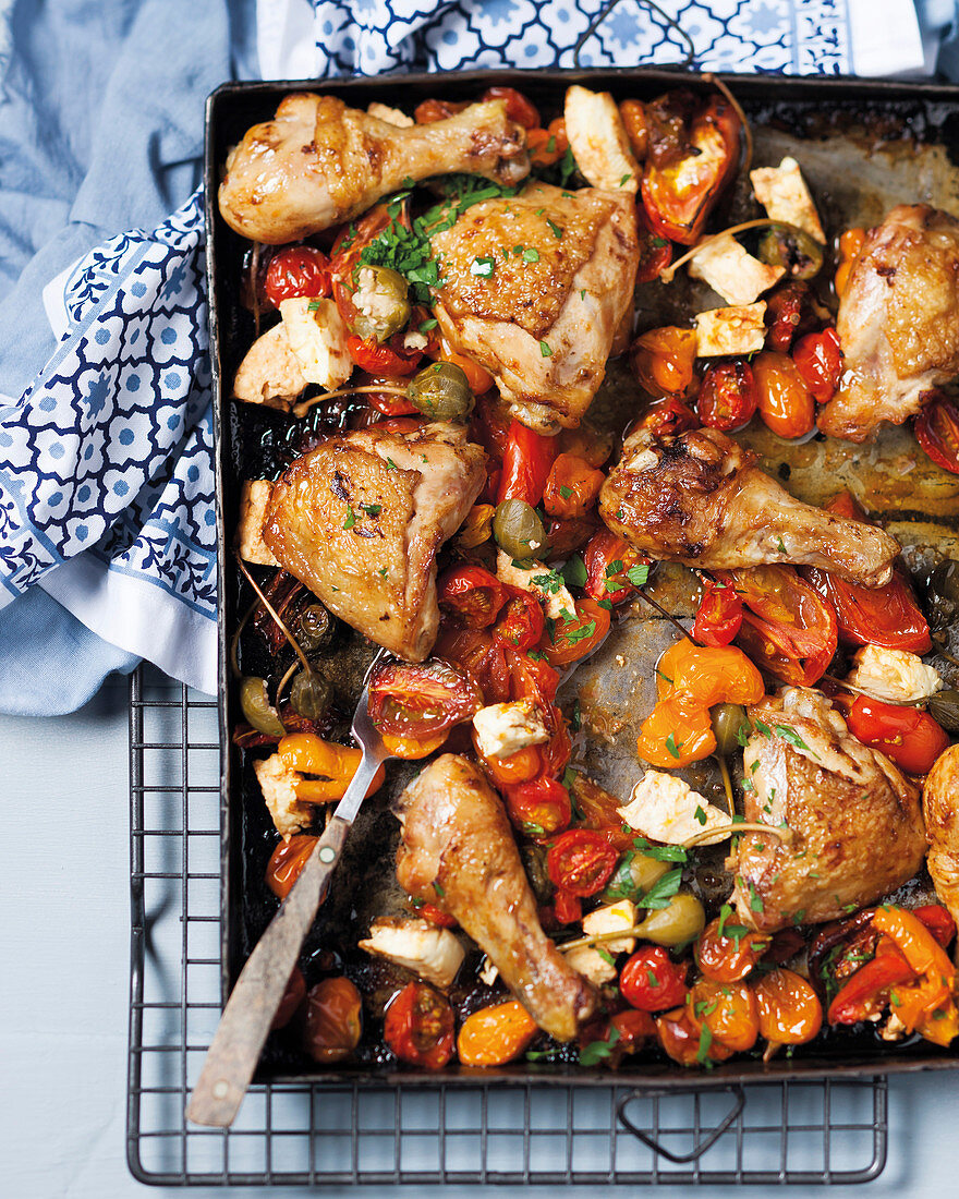 Oven-roasted chicken with feta, capers and tomatoes