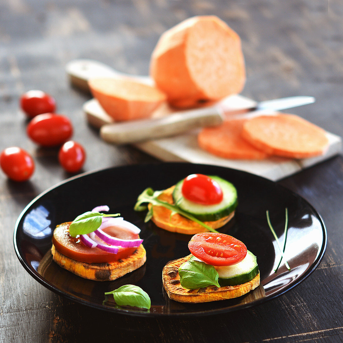 Sweet potato toasts with fresh vegetables as canapés