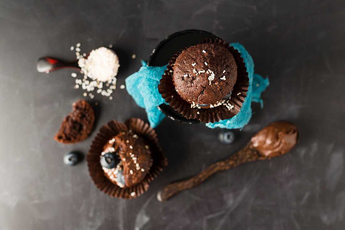 Chocolate muffins filled with chocolate cream and blueberries