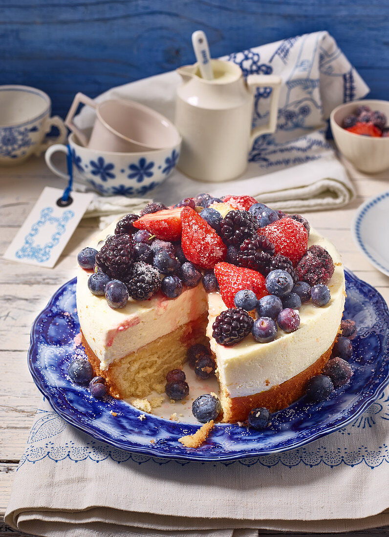 Sponge cake with orange yoghurt cream and berries