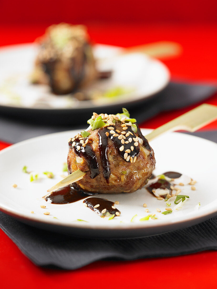 Meatballs with Hoisin sauce and sesame seeds (Asia)