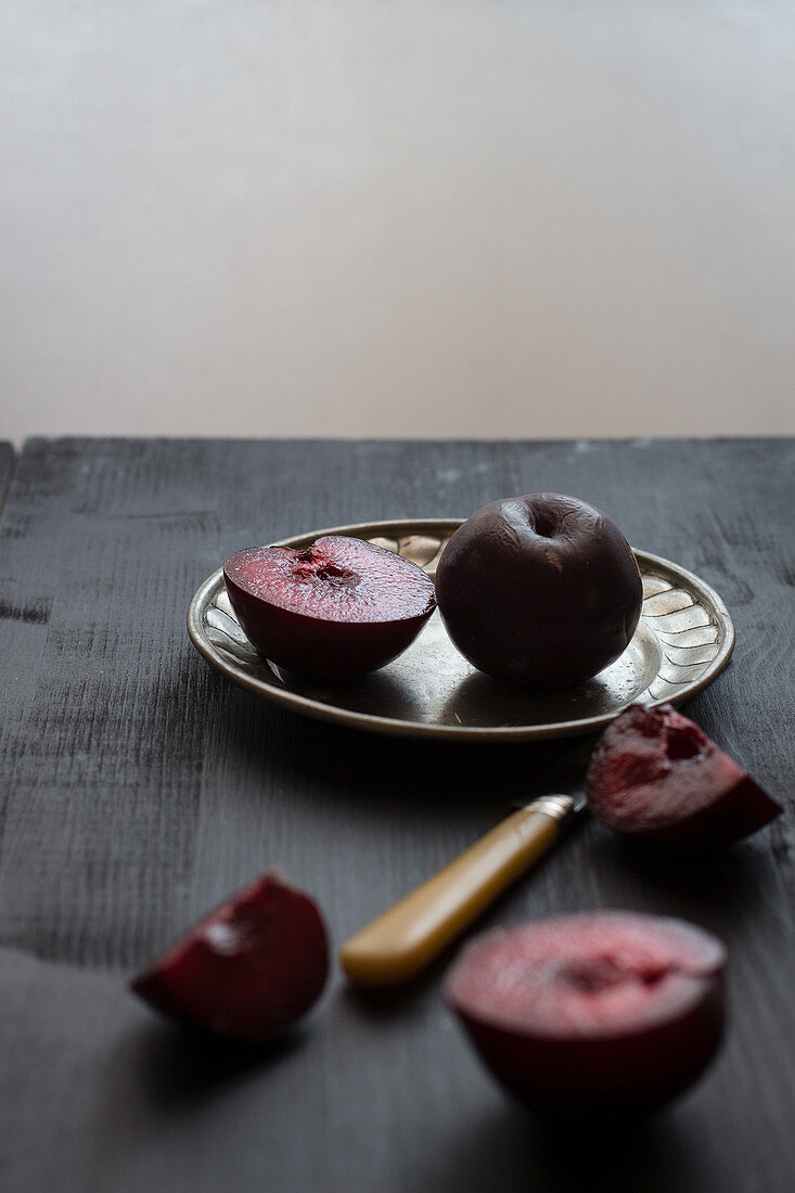 Plums, whole and sliced
