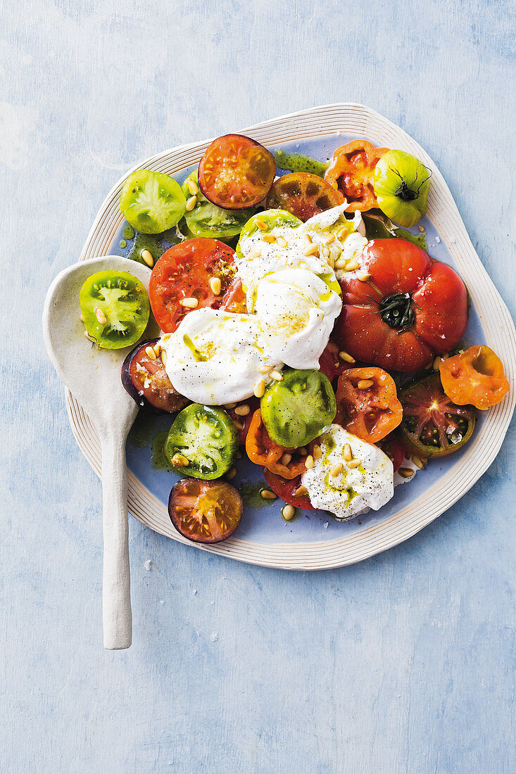 Heirloom tomato salad with mozzarella and herb oil