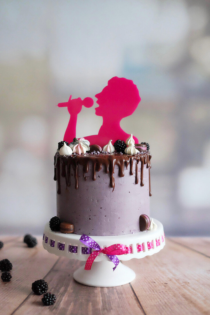 A blackberry and chocolate dripping cake