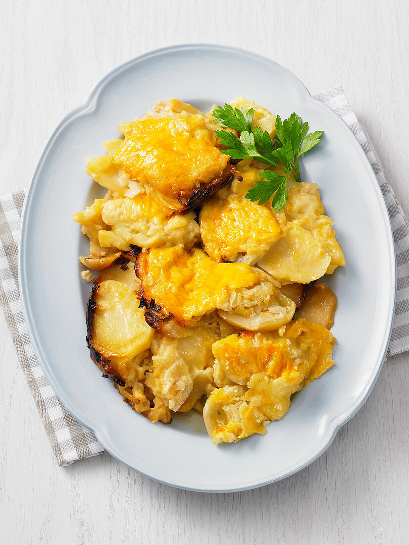 Roast potatoes with melted cheese