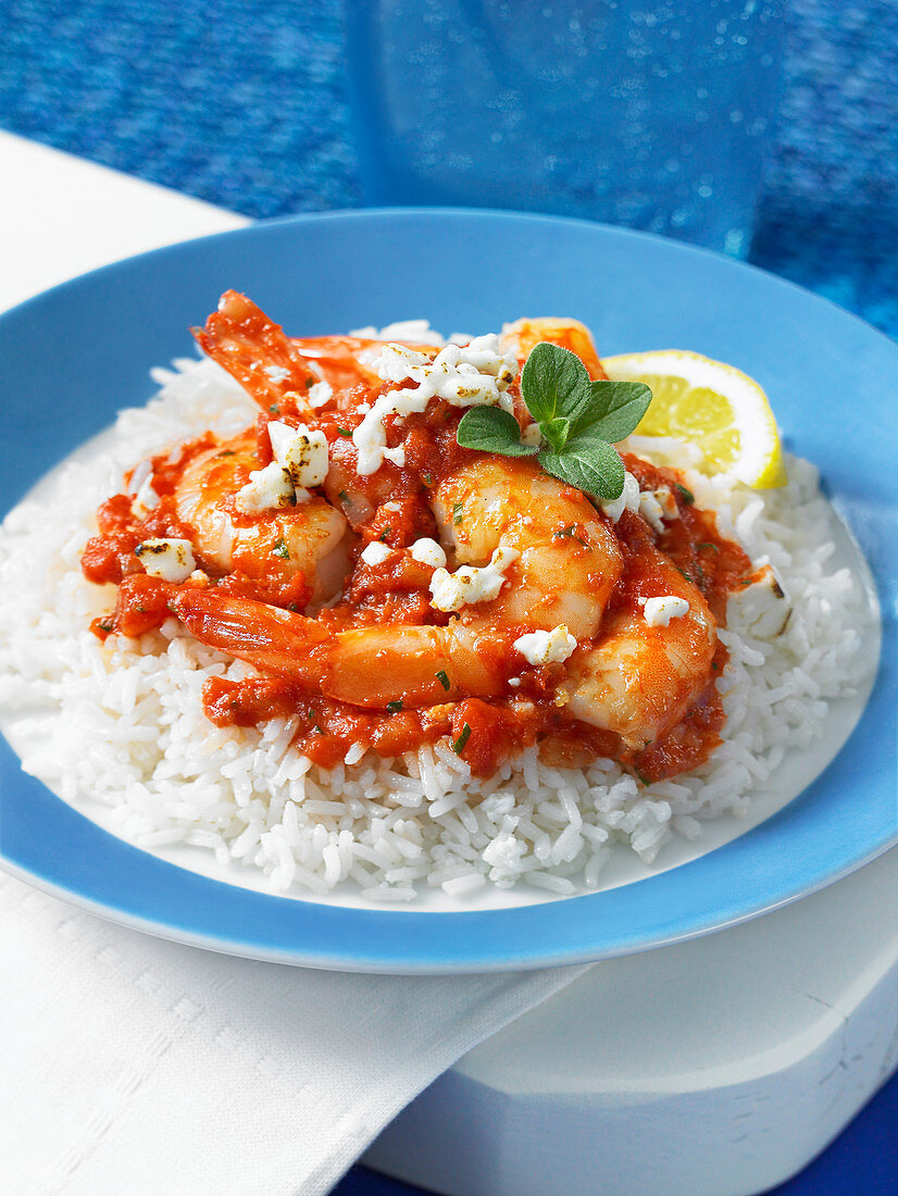 Shrimp with tomato and feta on rice