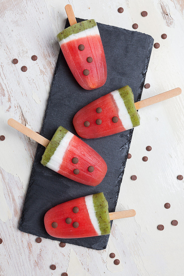 Watermelon ice lollies made with coconut milk and kiwi
