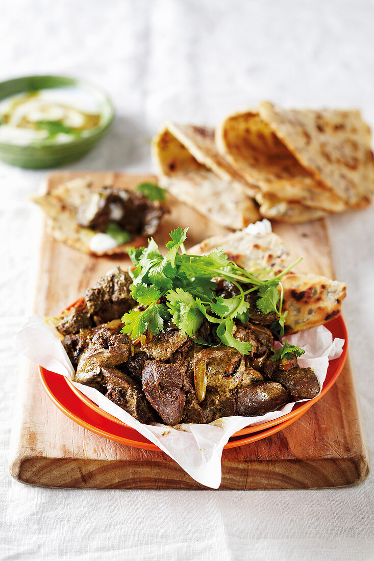 Spicy chicken livers with flatbread