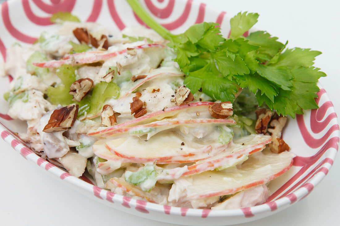 Apple salad with walnuts and mayonnaise