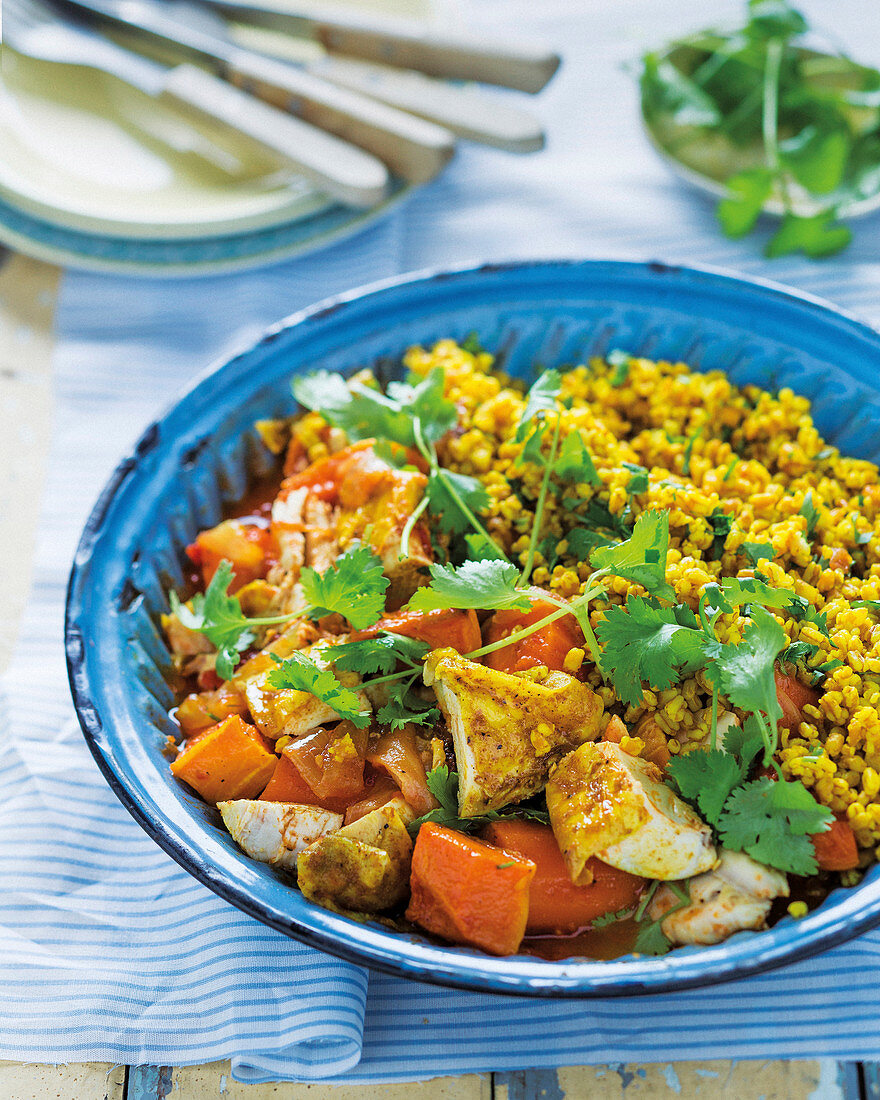 Chicken and pumpkin curry with golden wheat