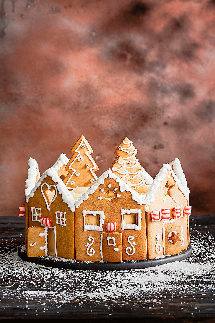 Christmas cake decorated with gingerbread houses