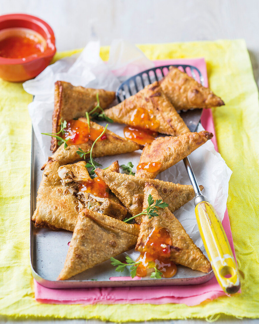 Sardine samosas and chili sauce