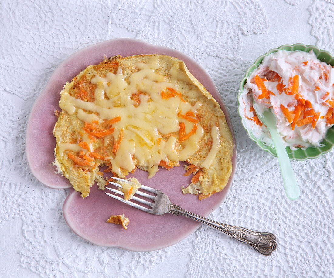 Grantinated pancakes with carrots and cheese