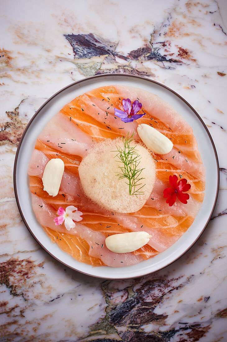 Salmon ceviche with edible flowers