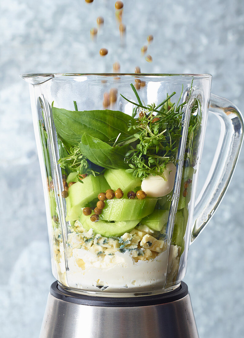 ingredients for cucumber and basil spread in a blender