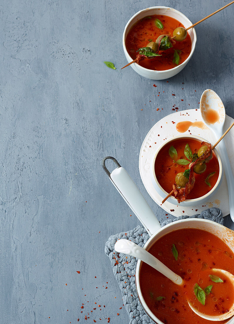 Tomato soup with herb and bacon olives