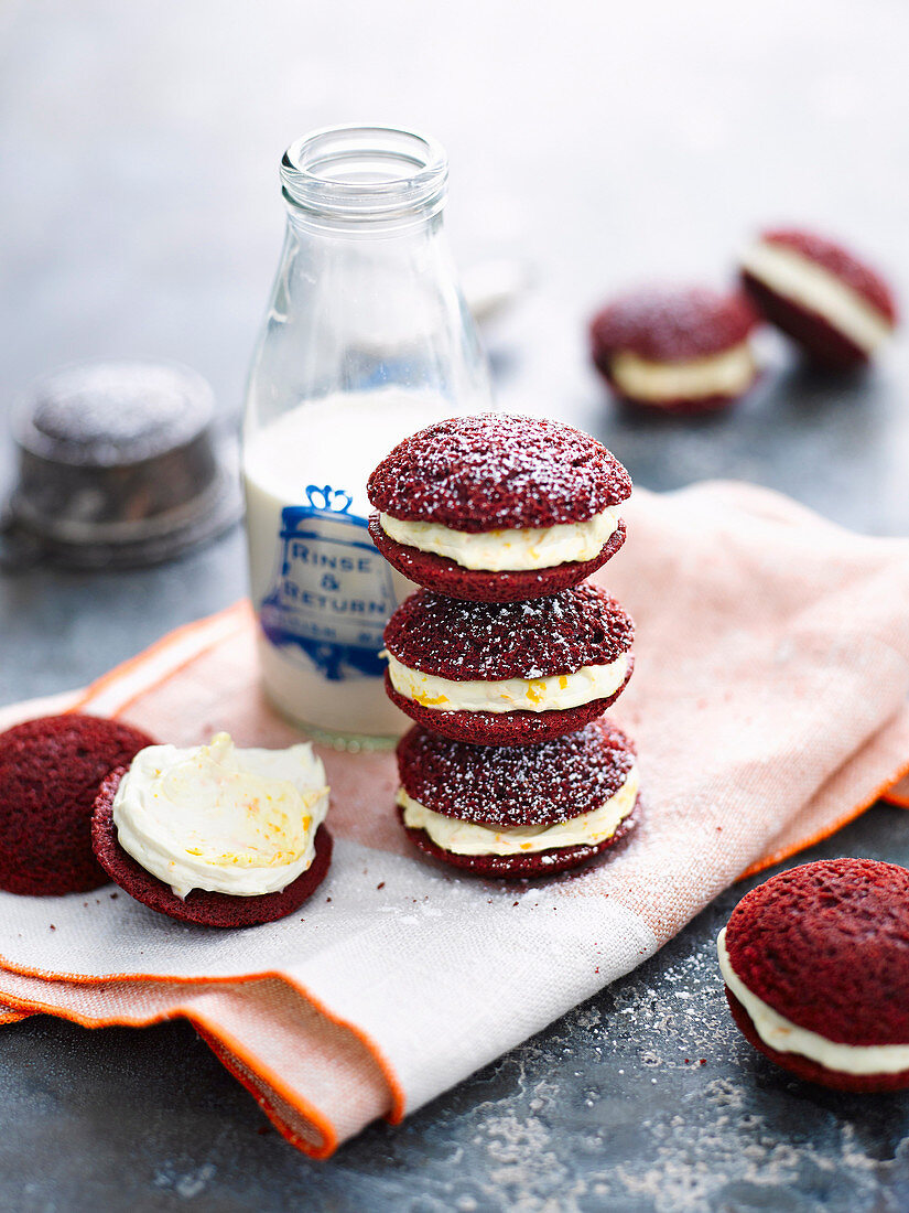 Red Velvet Whoopie Pies with orange cream filling (gluten-free)