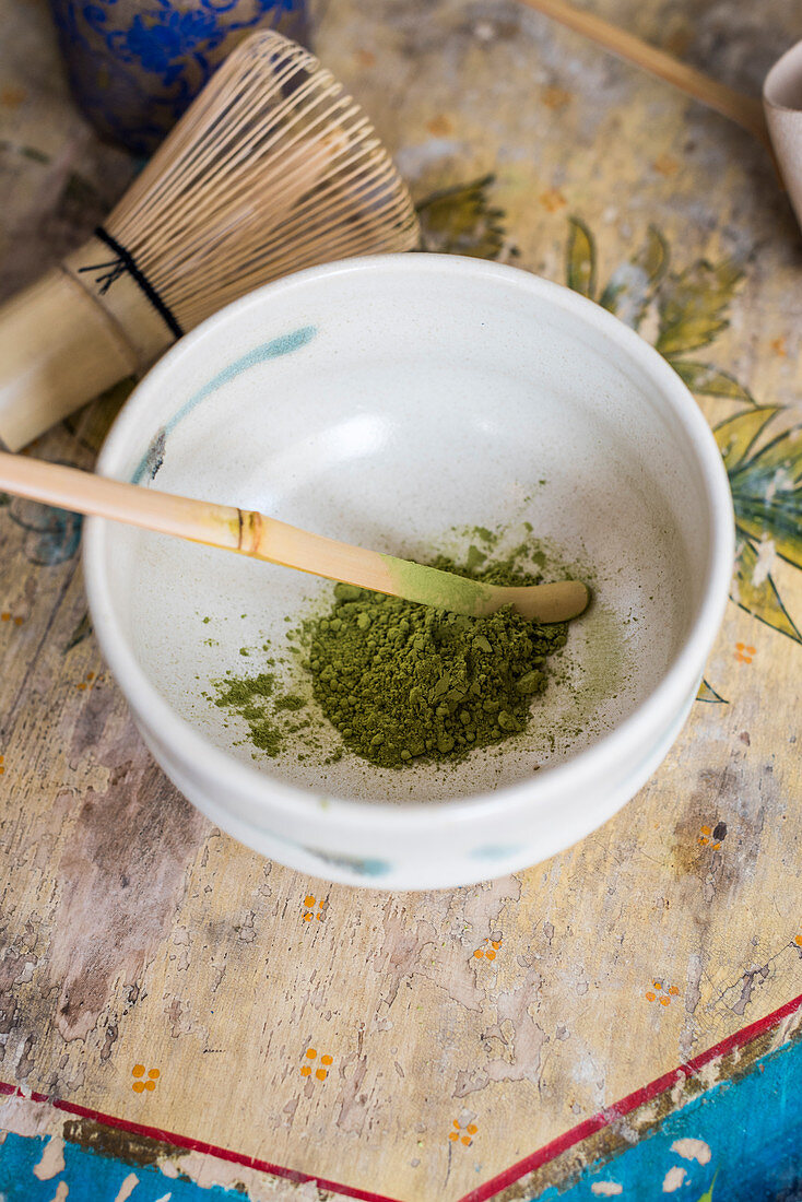 A bowl of matcha tea powder