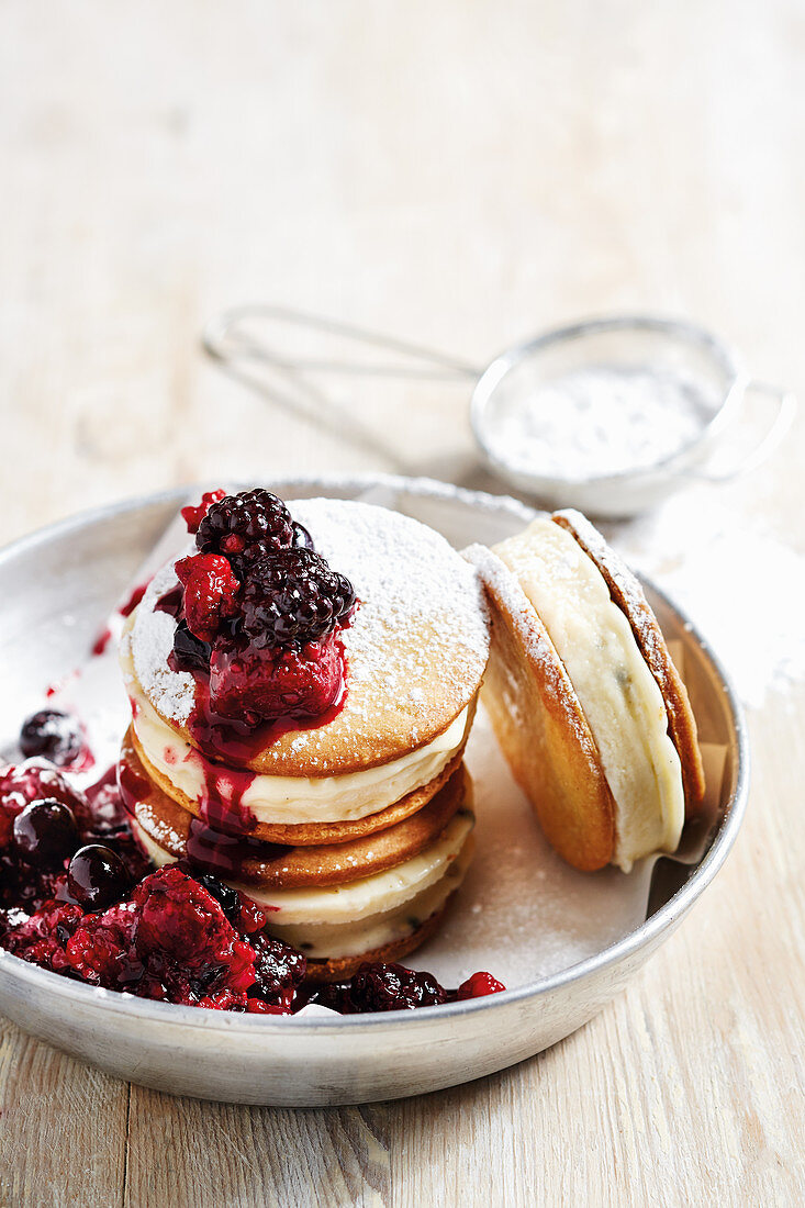 Shortbread ice cream sandwiches with a berry sauce